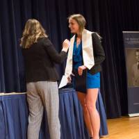 Emily placing a stole on Kathryn Thornton